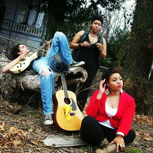 Event photo art work with three band members gathered around an old house